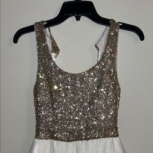 Formal gold and white dress. Tie in the back.